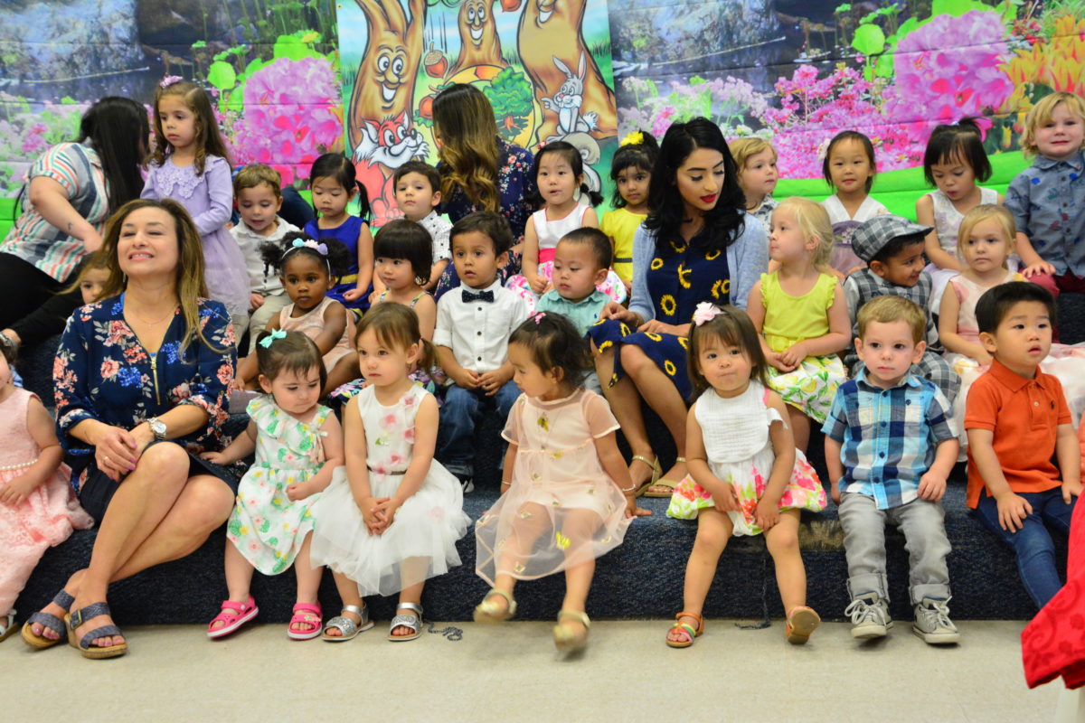 Group of children in a classroom setting.